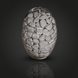 Silver Huum Drop 9KW sauna heater add-on, egg-shaped with a metal cage holding gray stones.