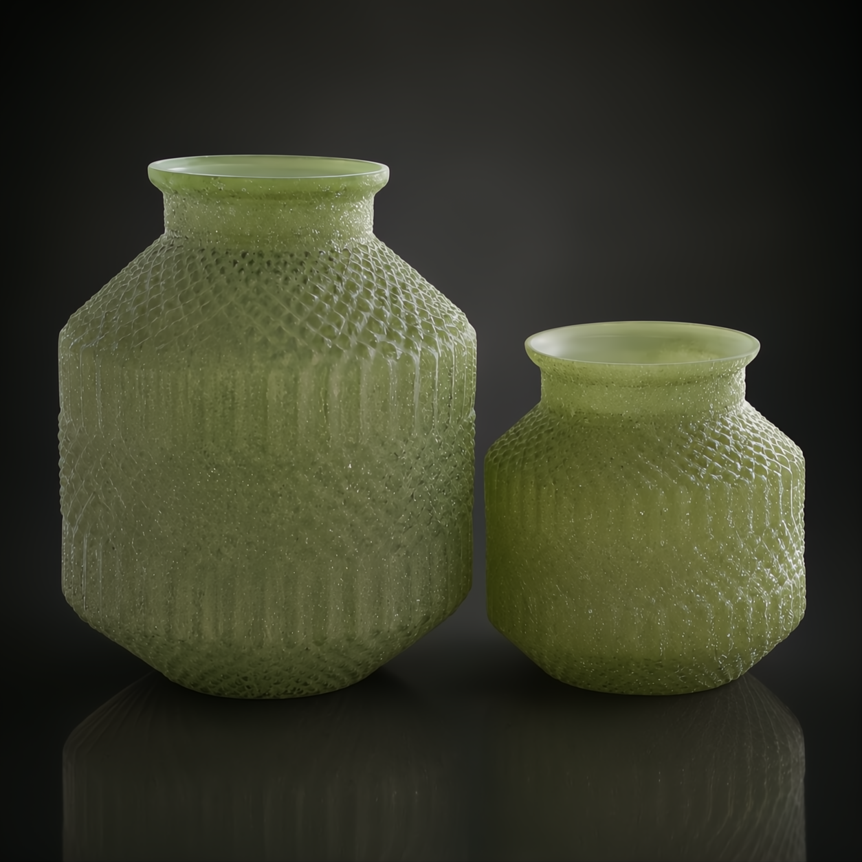 Set of two green marbled glass decorative accents with textured sculptural forms.