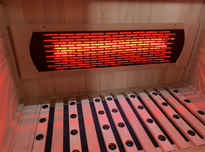 Lumin Three infrared sauna interior with glowing red heater, light Canadian Hemlock wood, and slatted bench.