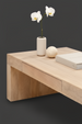 Minimalist modern Surya Coburn coffee table in light brown mango wood, featuring a clean, structured design.