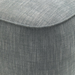 Close-up of the Surya Adalei accent chair's gray polyester-linen fabric with subtle texture and tailored piping.
