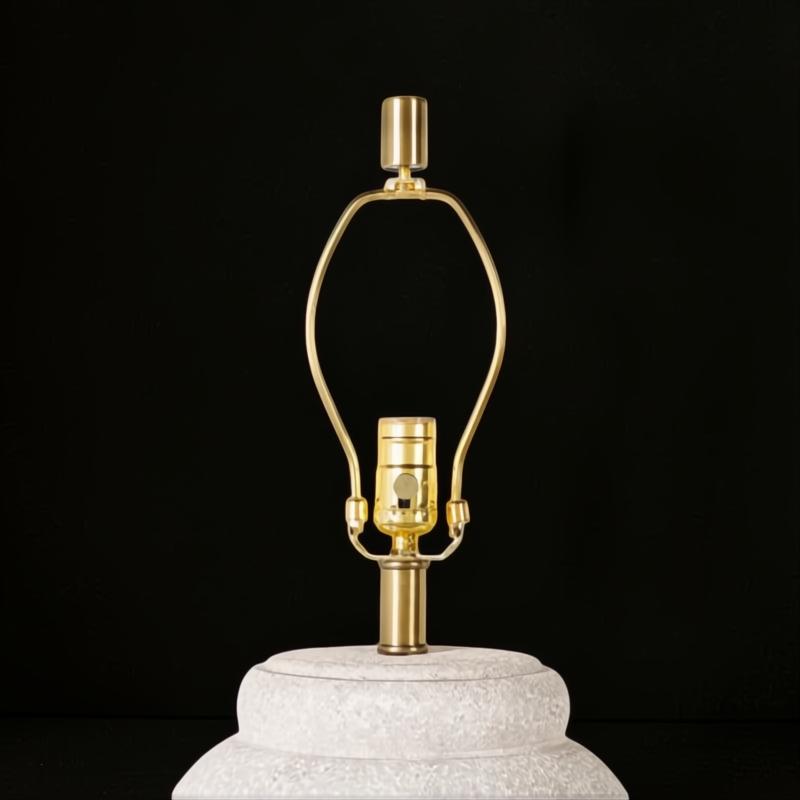 Surya Capelli accent table lamp base with a white ceramic body and gold-tone metal harp.