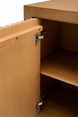Beige natural ash wood veneer Lulea Cabinet with 3D patterned door open, revealing adjustable shelves.