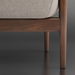 Close-up of Surya Brielle accent chair with camel polyester upholstery and stained ash wood base.