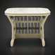 Surya Winder outdoor end table with cream aluminum top and handwoven PE rope detail.