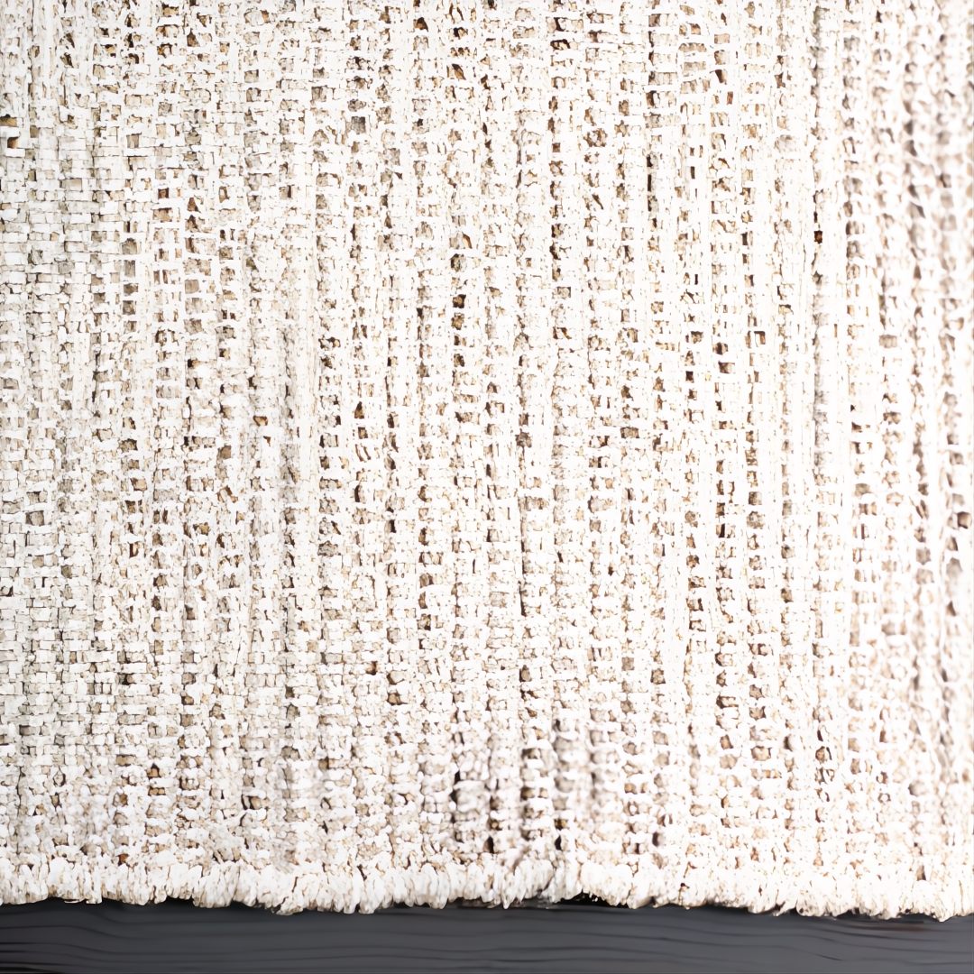 Close-up of a Surya Azalea AZA-2326 handmade rug, showing its light beige, black, and gray woven recycled PET yarn texture.