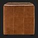 Surya Oryan RYAN-001 modular sofa with brown leather upholstery, knife-edge design, and black rubber wood base.