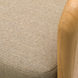 Close-up of Surya Palma Dining Chair: taupe Sunbrella acrylic upholstery and light teak wood arm.