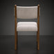 Surya Bergene dining chair with light beige upholstery and a brown natural rubber wood base.