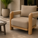 Surya Palma outdoor accent chair with beige Sunbrella cushion, teak wood frame, and PE rope-wrapped arms.