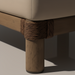Close-up of a brown Surya Porta sectional leg with rope detailing and a beige Sunbrella cushion.