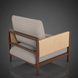 Surya Brielle accent chair with camel polyester upholstery, dark ash wood frame, and woven side panels.