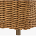Close-up of Marvella sectional's woven brown Sunbrella acrylic base with a dark brown aluminum leg.