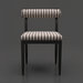 Surya Antibes outdoor dining chair with black powder-coated aluminum base and striped Sunbrella fabric.
