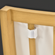 Close-up of Surya Cape Town Dining Chair's wheat hand-painted aluminum frame and white Sunbrella® cushion strap.