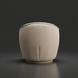 Surya Ariah beige polyester swivel chair with a modern, rounded design and black iron base.