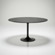 Surya Anatalia round dining table with a black polished marble top and black iron pedestal base.