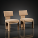 Set of two Surya Sitara dining chairs with beige polyester covers and natural rubber wood bases.
