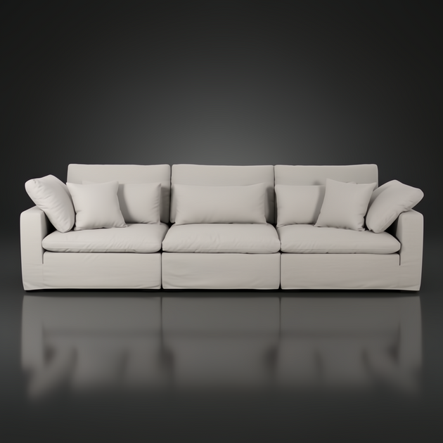 Surya Avington 130" wide slipcover sofa in light linen-polyester, featuring a relaxed, modern design.