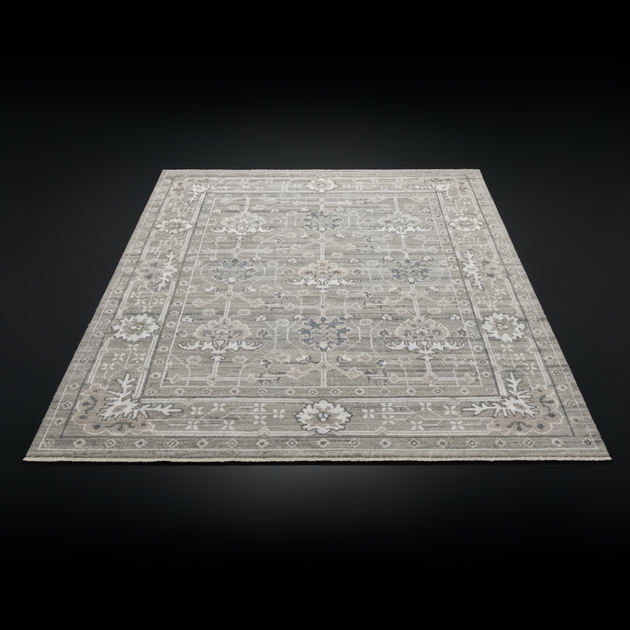 Surya Almeria low pile area rug with intricate floral patterns in medium gray, gray, and cream.
