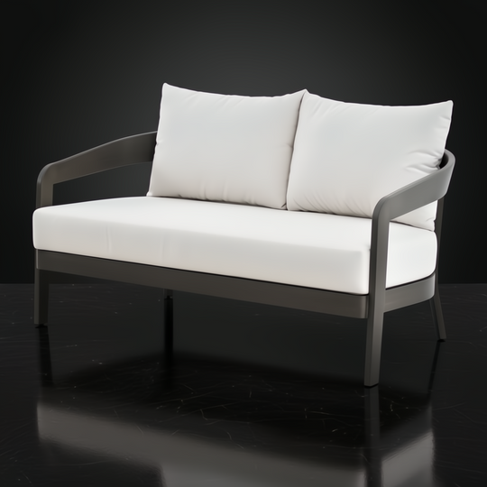Surya Daniella outdoor loveseat with gray aluminum frame and white Sunbrella cushions.
