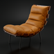 Surya Laval modern accent chair with brown leather cushions, black lacquered iron base, and deep lounge style.