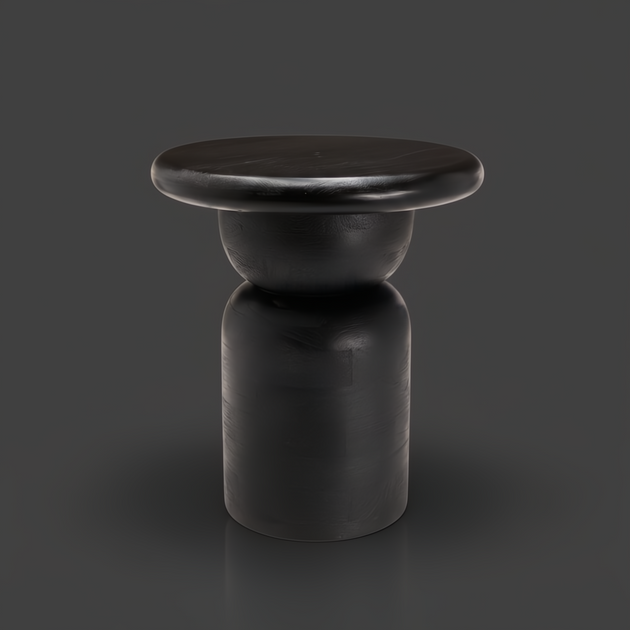 Surya Koben black mango wood end table with a compact round top and turned base.