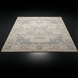 Hand-knotted Surya Cappadocia wool rug with traditional gray and green patterns on a light background, fringe detail.