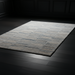 Surya Calgary CGR-2306-P area rug with pale blue, dark blue, white, ice blue, and light beige tones.