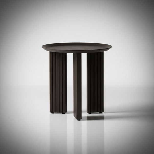 Blackened mango wood Surya Agnes end table with round top and zigzag fluted legs.