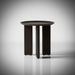 Blackened mango wood Surya Agnes end table with round top and zigzag fluted legs.