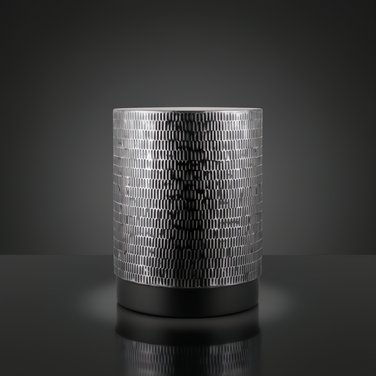 Surya Amenet End Table with silver gray hammered iron top and black base.