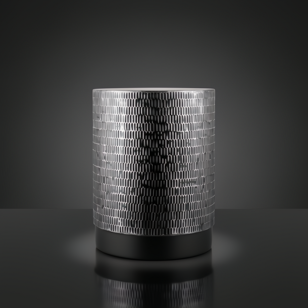 Surya Amenet End Table with silver gray hammered iron top and black base.