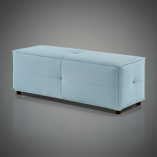 Light blue upholstered Surya Andra Ottoman bench with button tufting and wood feet.
