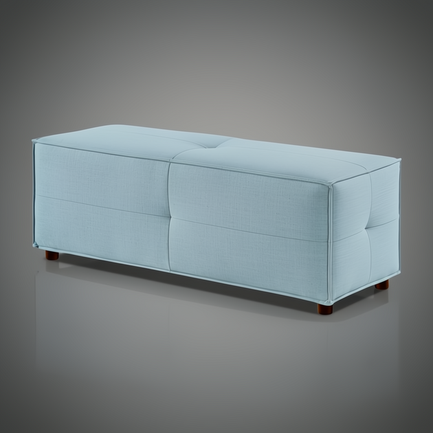 Light blue upholstered Surya Andra Ottoman bench with button tufting and wood feet.