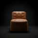 Surya Oryan RYAN-001 modular chair with brown tufted leather upholstery and a black base.