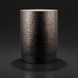 Surya Amenet round end table with gold hammered iron top and black base.