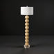Surya Algarve modern accent floor lamp with a stacked light wood resin base, white linen shade, and metal foot.
