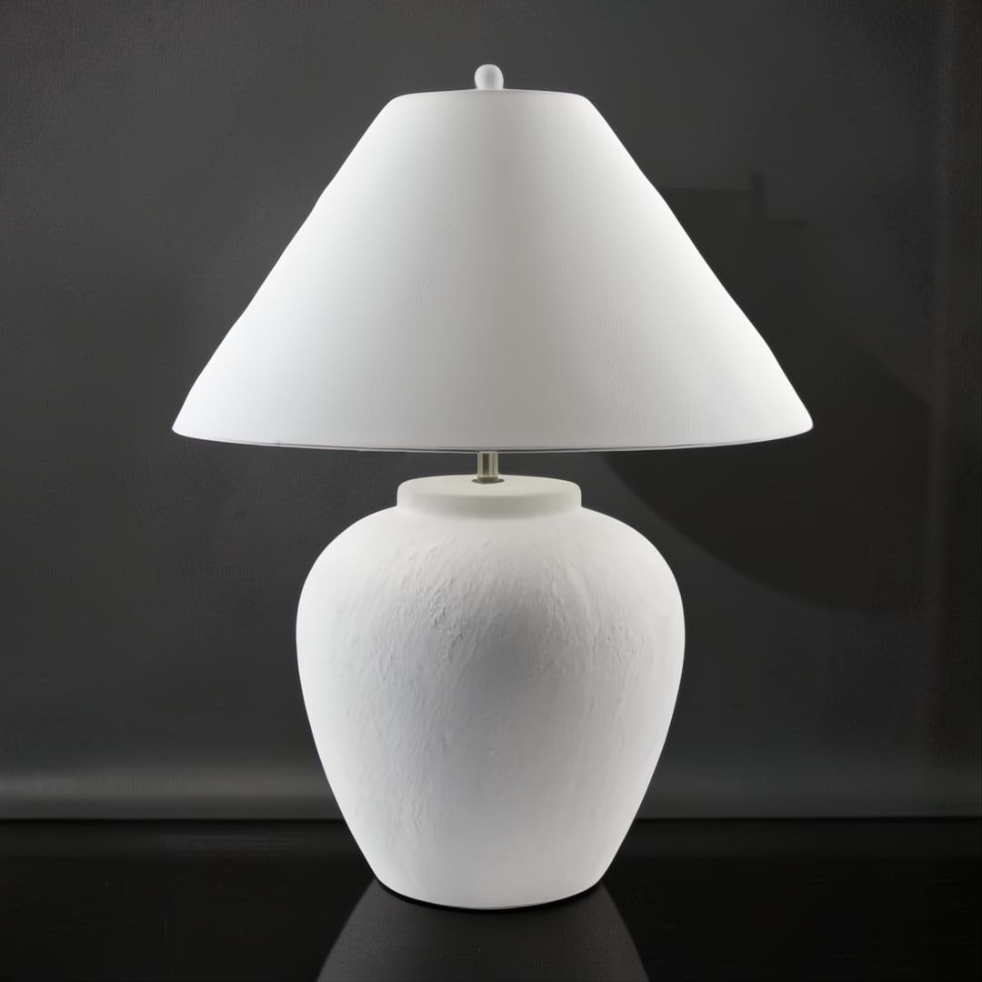 Surya Arion accent table lamp with a cream ceramic base and white linen shade.