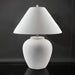 Surya Arion accent table lamp with a cream ceramic base and white linen shade.