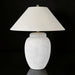 Surya Capelli accent table lamp with a textured white ceramic base and a light fabric shade.