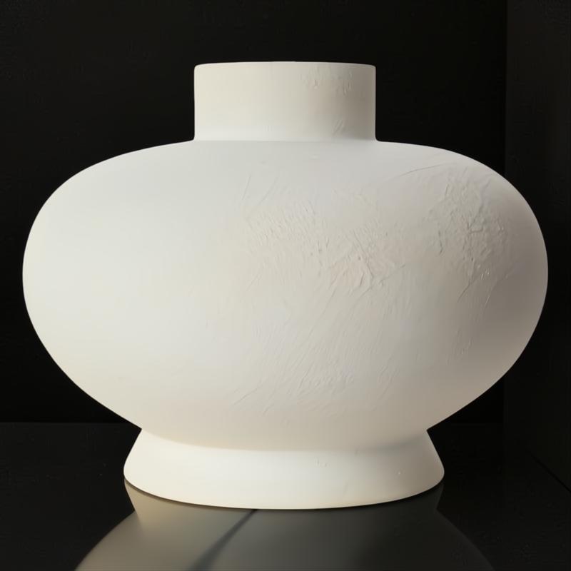 Surya Acanceh CCH-005-P, a modern white ceramic decorative accent with a sculptural, vase-inspired design.