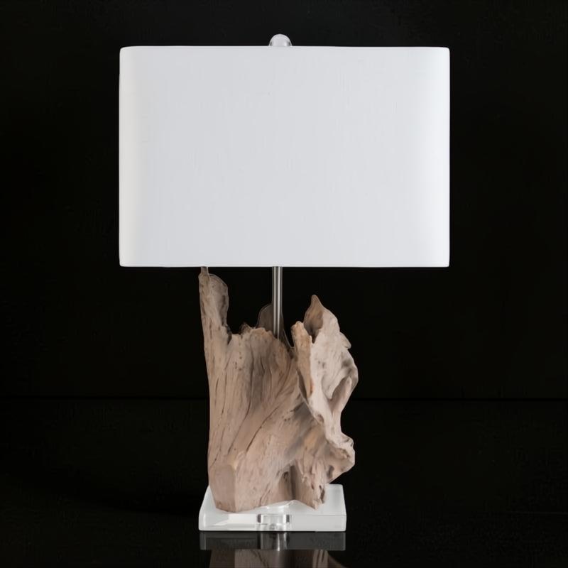 Darby Accent Table Lamp with a natural wood-look sculptural base, clear acrylic stand, and white fabric shade.