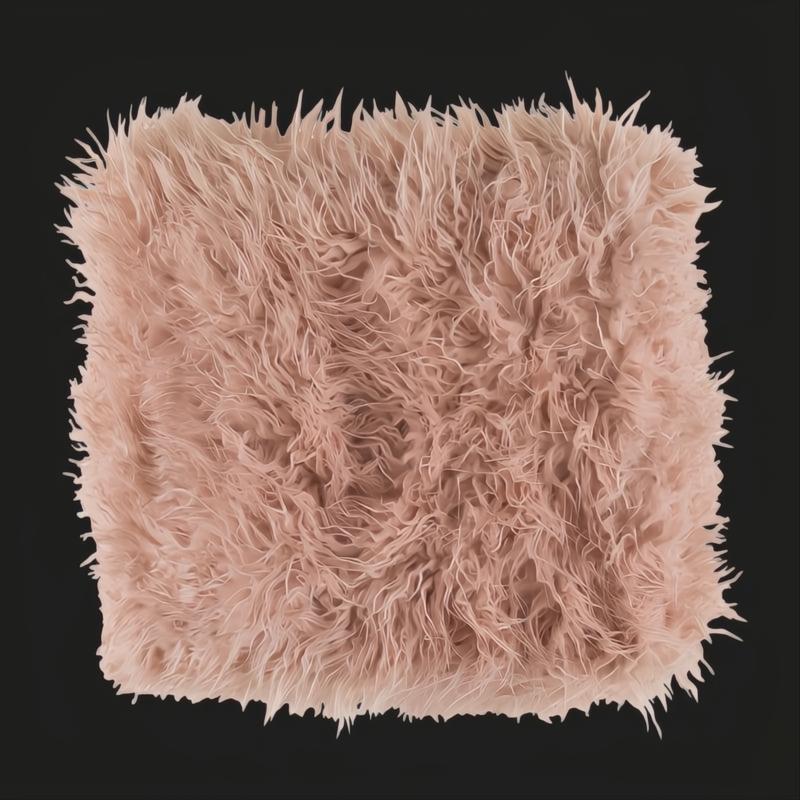 Soft, plush pink Surya Kharaa throw with shaggy texture, perfect for cozy modern decor.