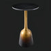 Minimalist Surya Alva end table with a black marble top and metallic bronze ombre iron base.
