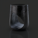 Surya Isiri black sandblasted mango wood end table with an oblong cut-out, 20"H.