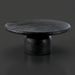 Surya Koben black sandblasted mango wood coffee table with a round top and turned base.
