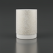 White cylindrical container with a textured, ribbed pattern and a smooth base.