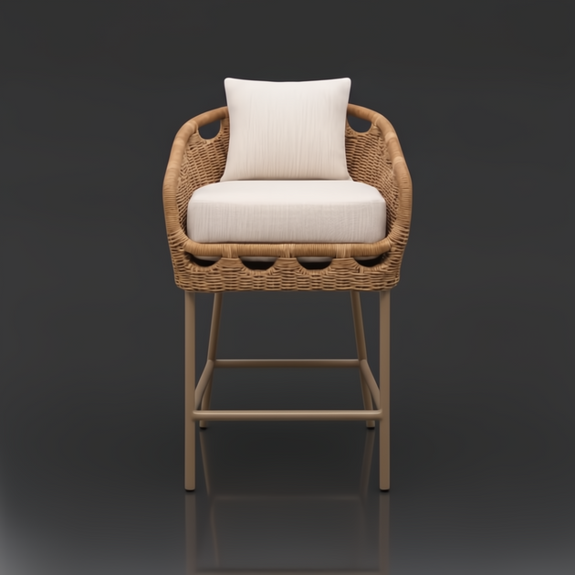Surya Marvella outdoor bar stool with natural wicker back, light beige Sunbrella cushions, and dark brown aluminum base.