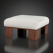 Square white polyester ottoman with sturdy brown rubber wood legs.